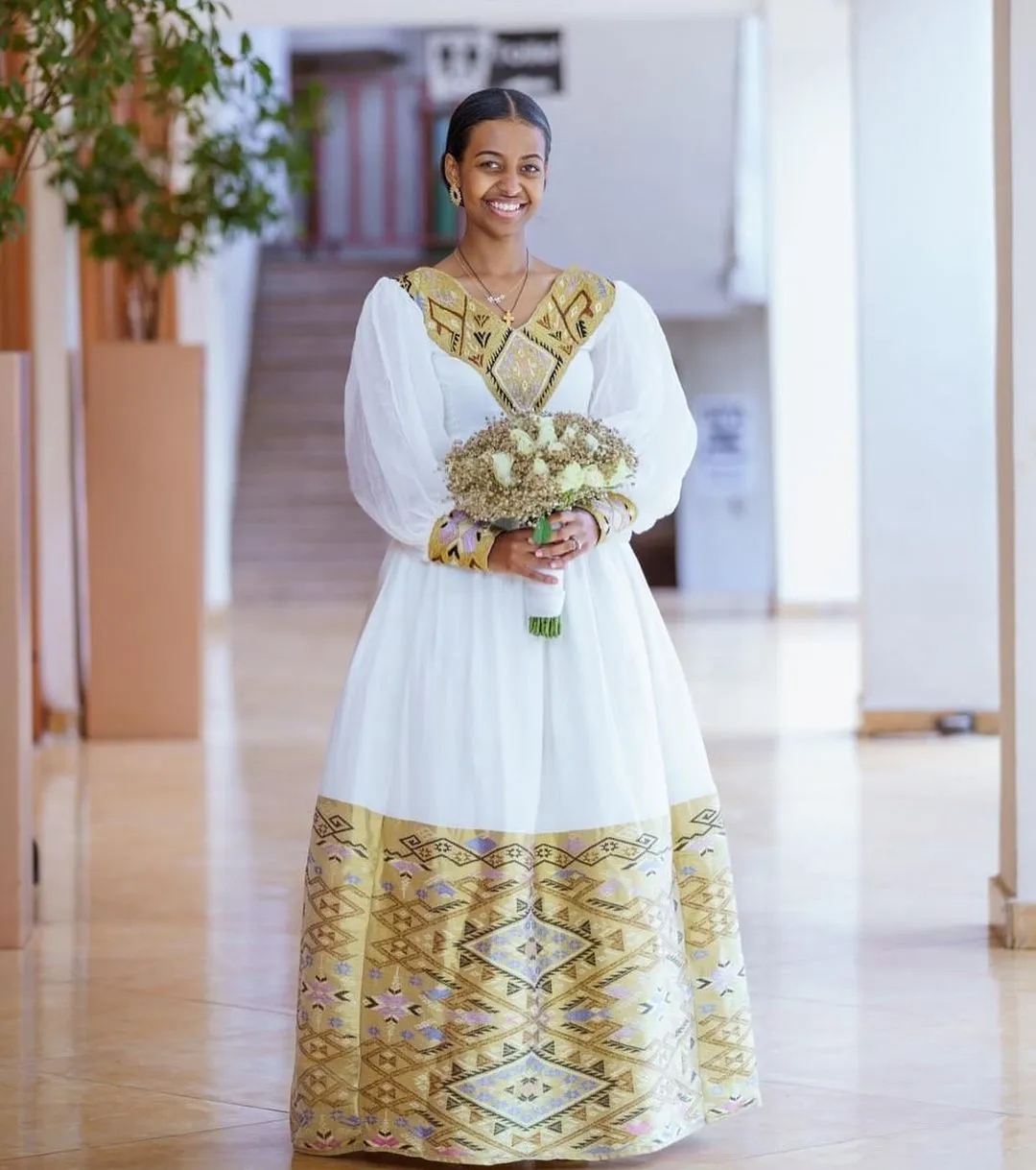 Contemporary Splendor: Modern Elegance in Habesha Couples Wedding Attire