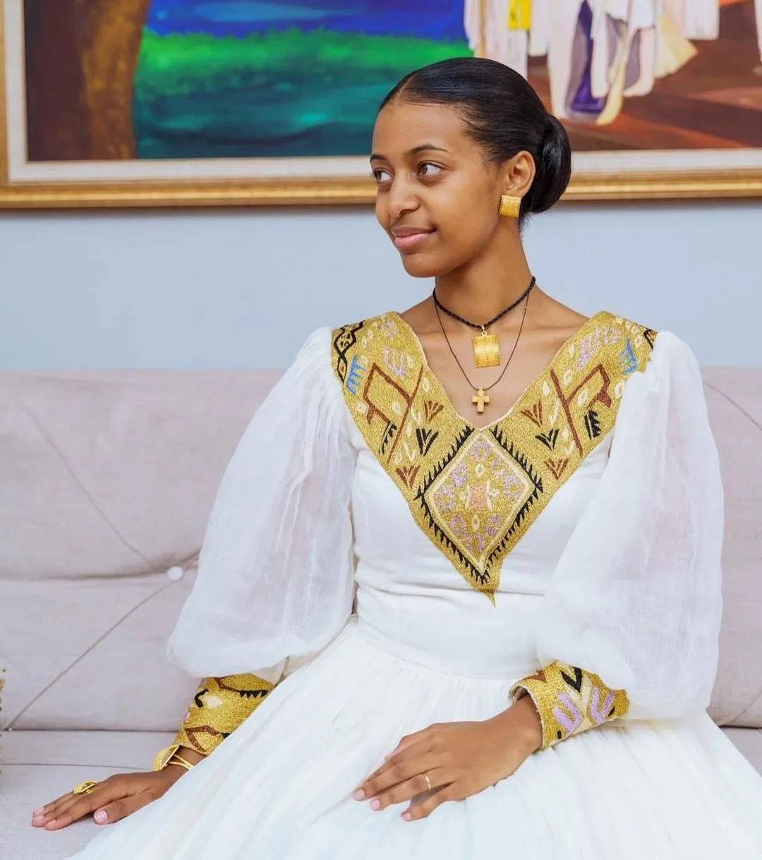 Contemporary Splendor: Modern Elegance in Habesha Couples Wedding Attire